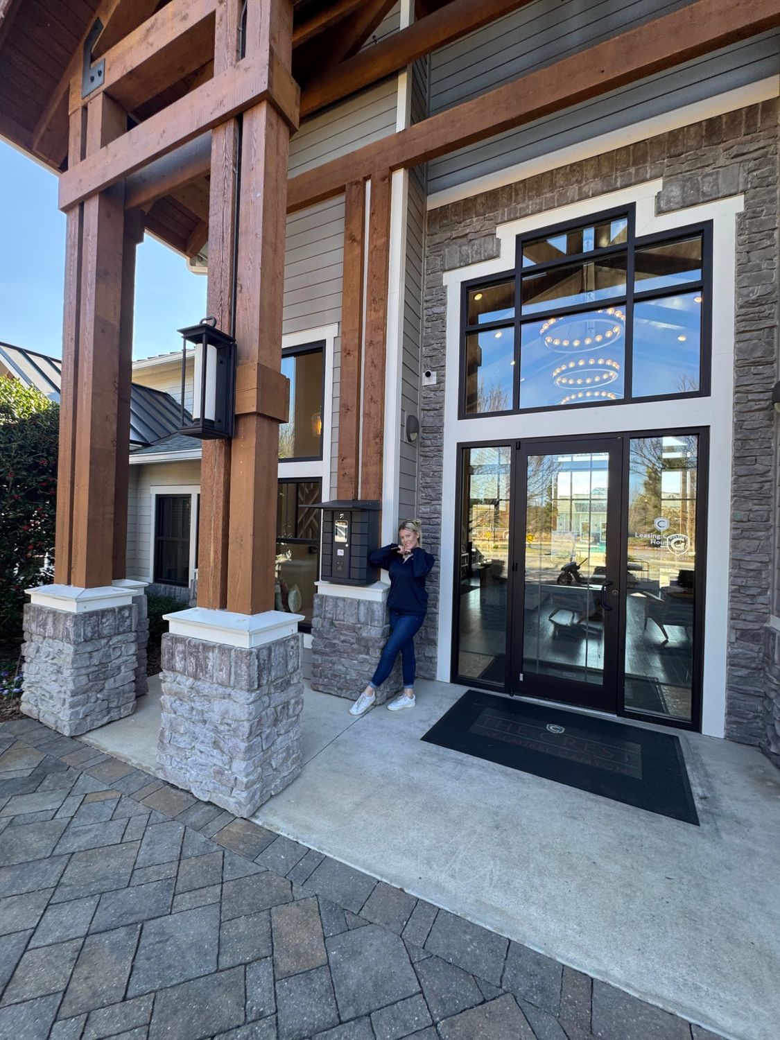 Leasing team member beside a Pineapple kiosk at The Crest at Laurel Canyon